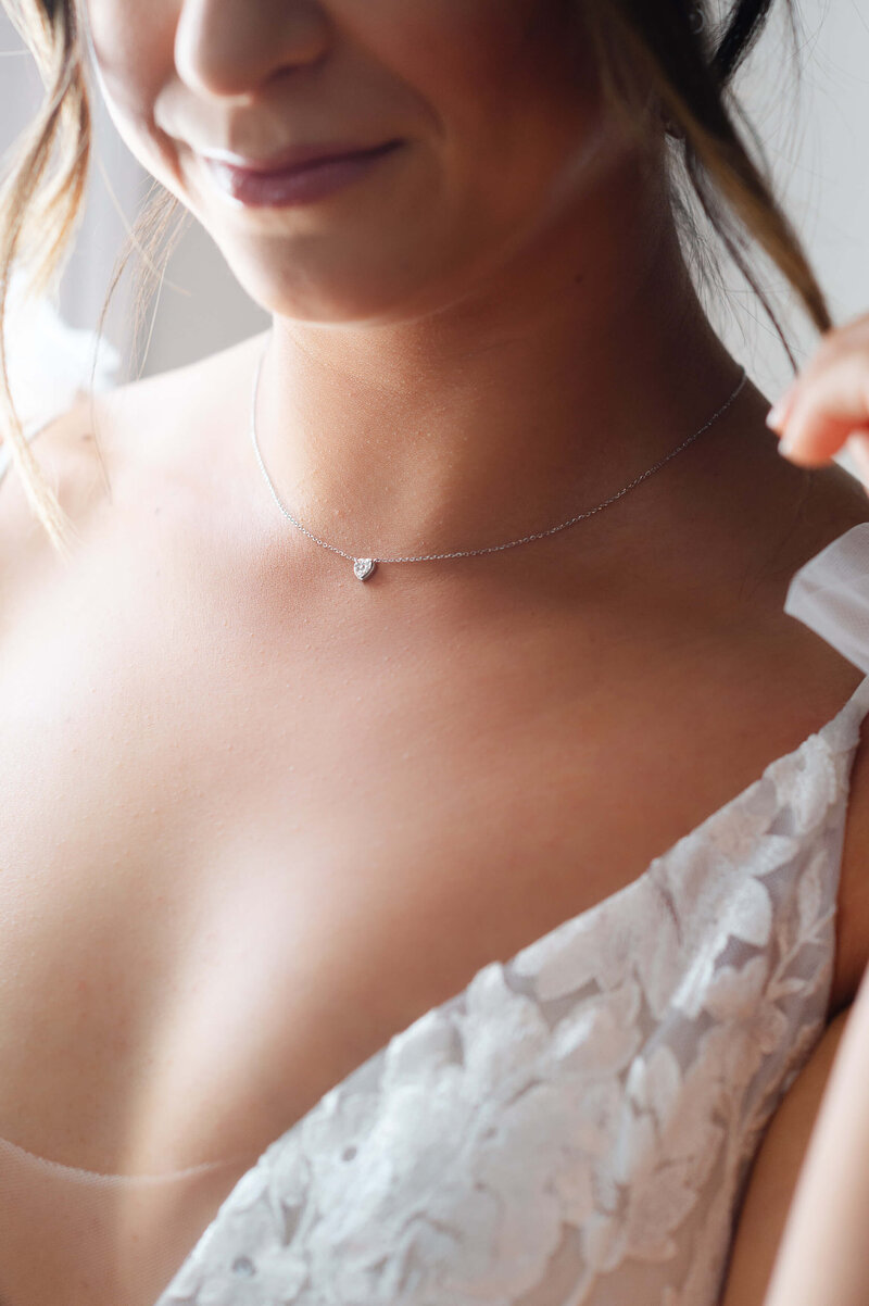 Ottawa wedding photography showing closeup photo of a bride's heart necklace