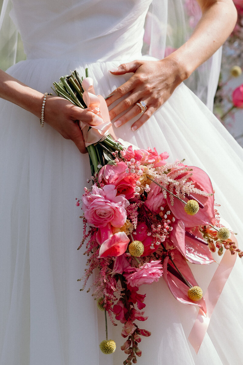 Vermont Wedding Photographer | Sincerely Liz Photography Documentary Wedding, Engagement, Elopement, Maternity and Newborn Photographer in New England | Bride holding a pink bouquet of flowers