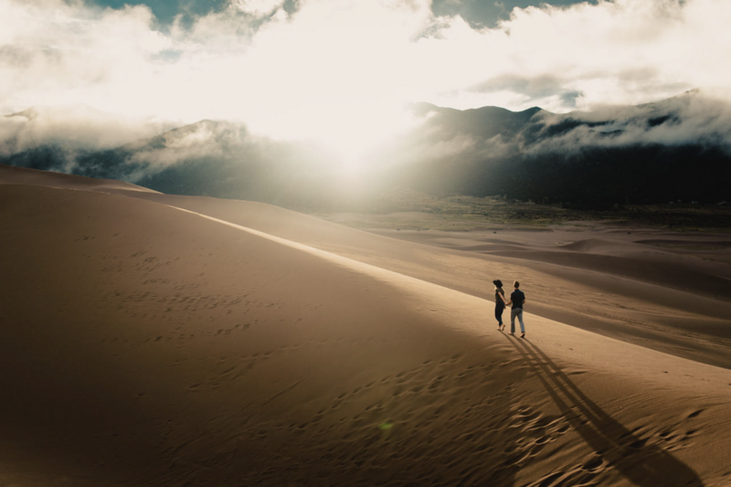 Engagement session at sunrise at Sand Dunes National Park. Parr Photo Co. Colorado wedding photographer.