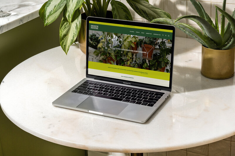 MacBook Pro Laptop PSD Mockup Template with Plants