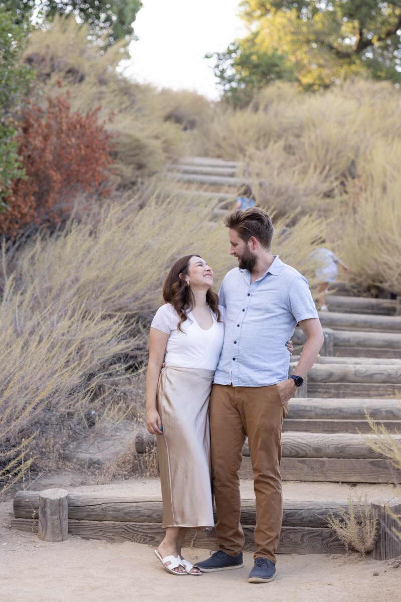 couple-standing-smiling-oakgrove-family-photoshoot