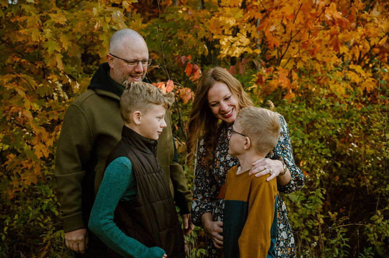 Family with two elementary aged boys in fall family photos