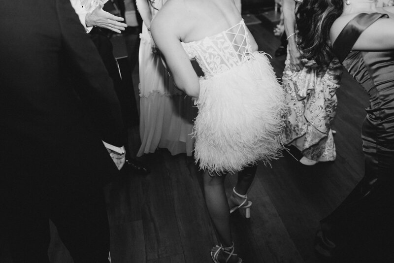Bride dancing in party dress