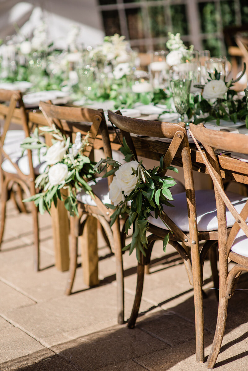 Wedding reception table with greenery