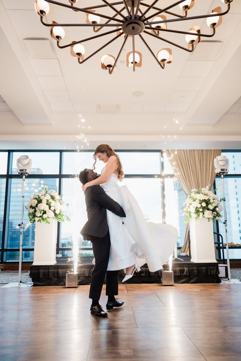 A couple during their first dance with cold sparks in a lift at the Ben, the Autograph Collection in West Palm Beach. 