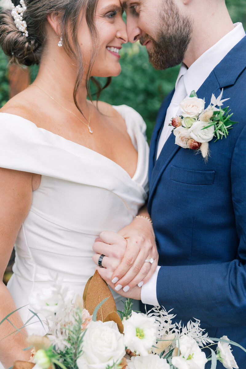 Close up of couple’s wedding rings on their wedding day