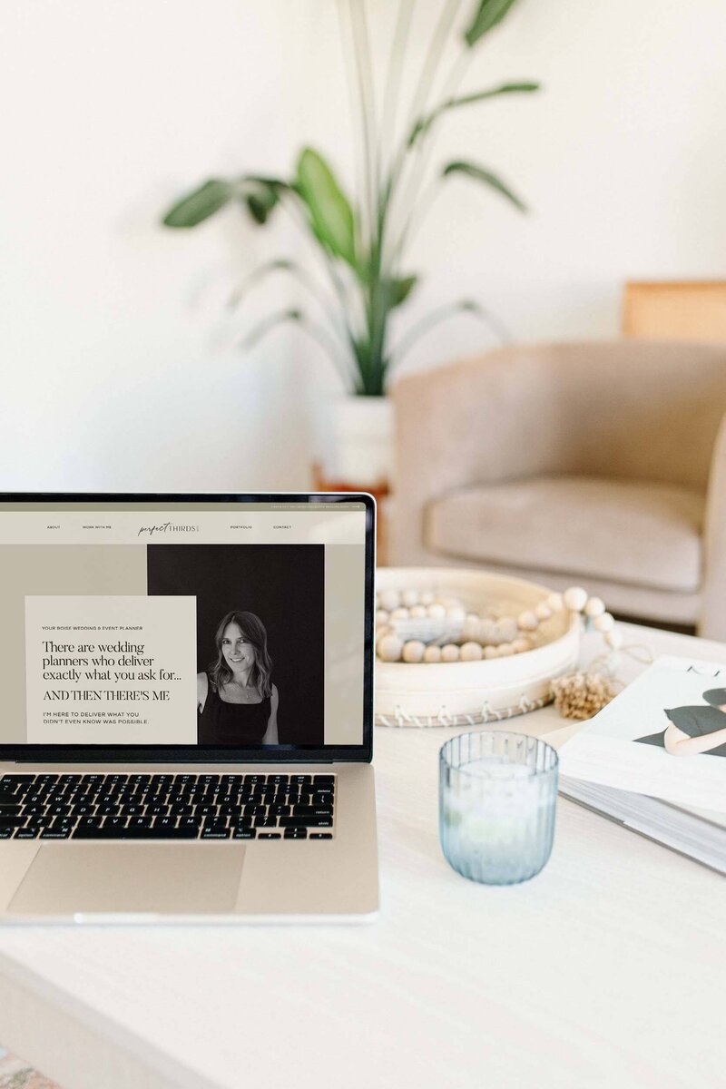 A laptop showing the a wedding planner's website with design done by Bloem Creations.