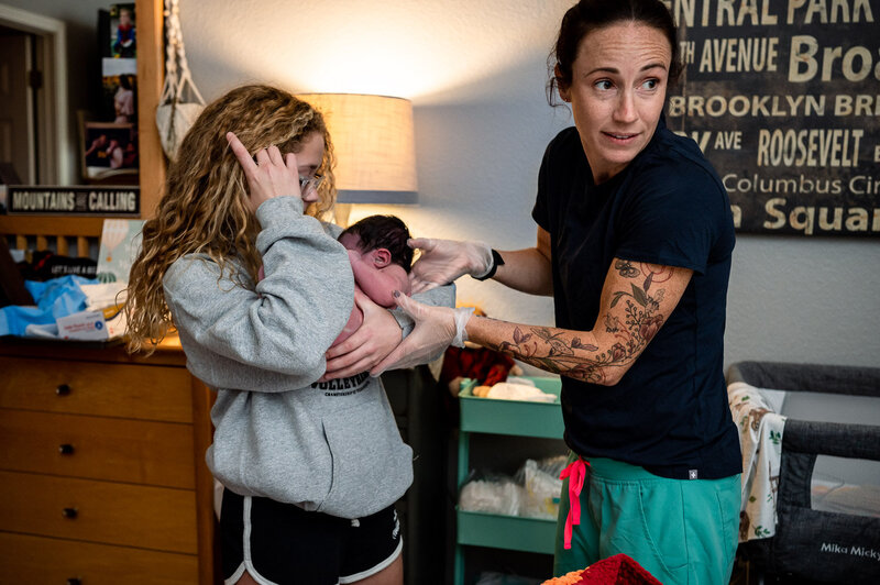Ashley King checks heartrate during homebirth labor in New Braunfels TX