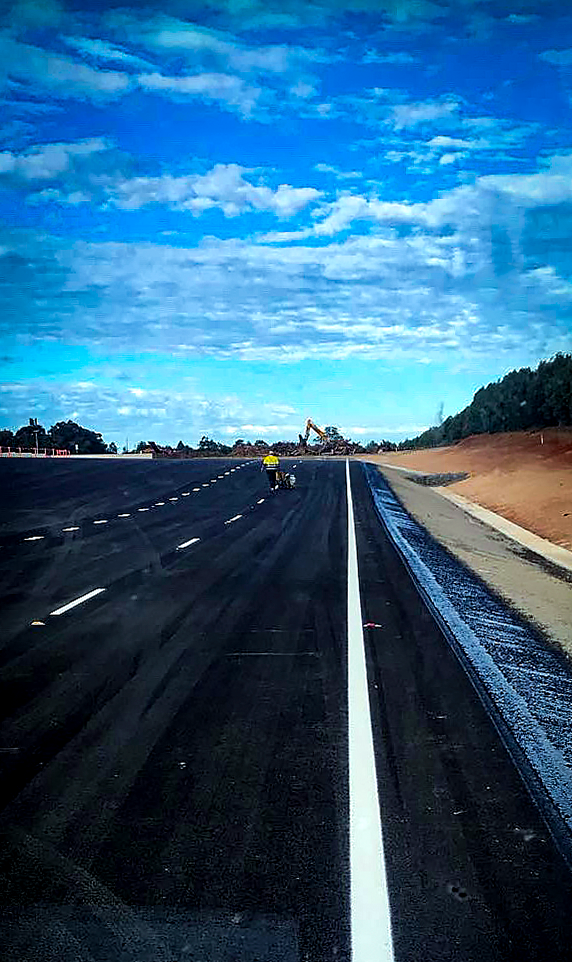 HERN Linemarking applying fresh road markings on a highway in South East Queensland, servicing Brisbane and Gold Coast.