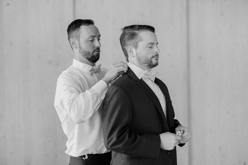 Groom preparing for ceremony in the groom’s suite at Canyonwood Ridge