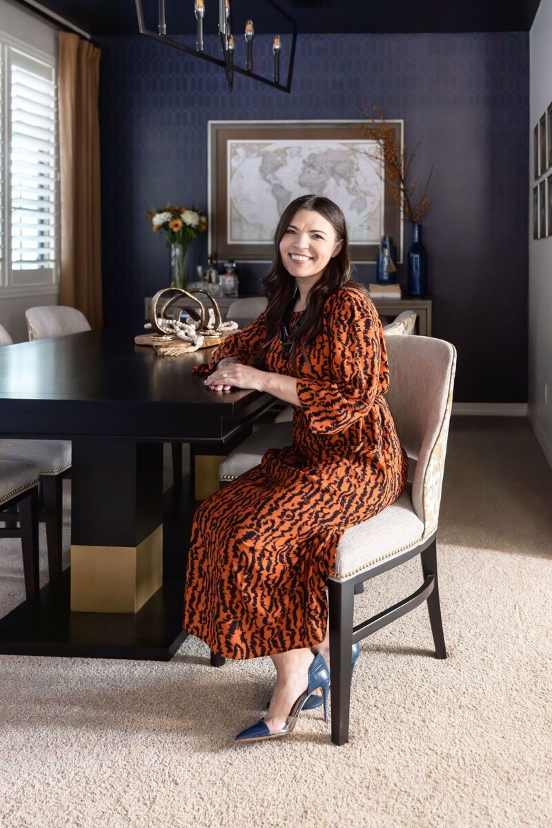 Stephanie Stuart Scottsdale interior designer in a bold, fun orange and leopard patterned fabric