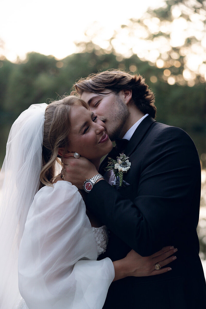 groom-kissing-brides-cheek-emily-snyder-photography-texas-destinations