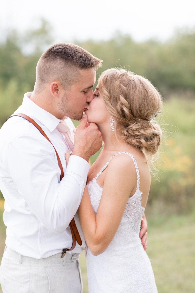 Wedding couple kissing close up