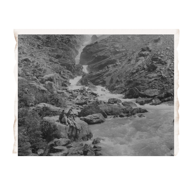 Alberta Destination Wedding Photographer on the trail by a waterfall