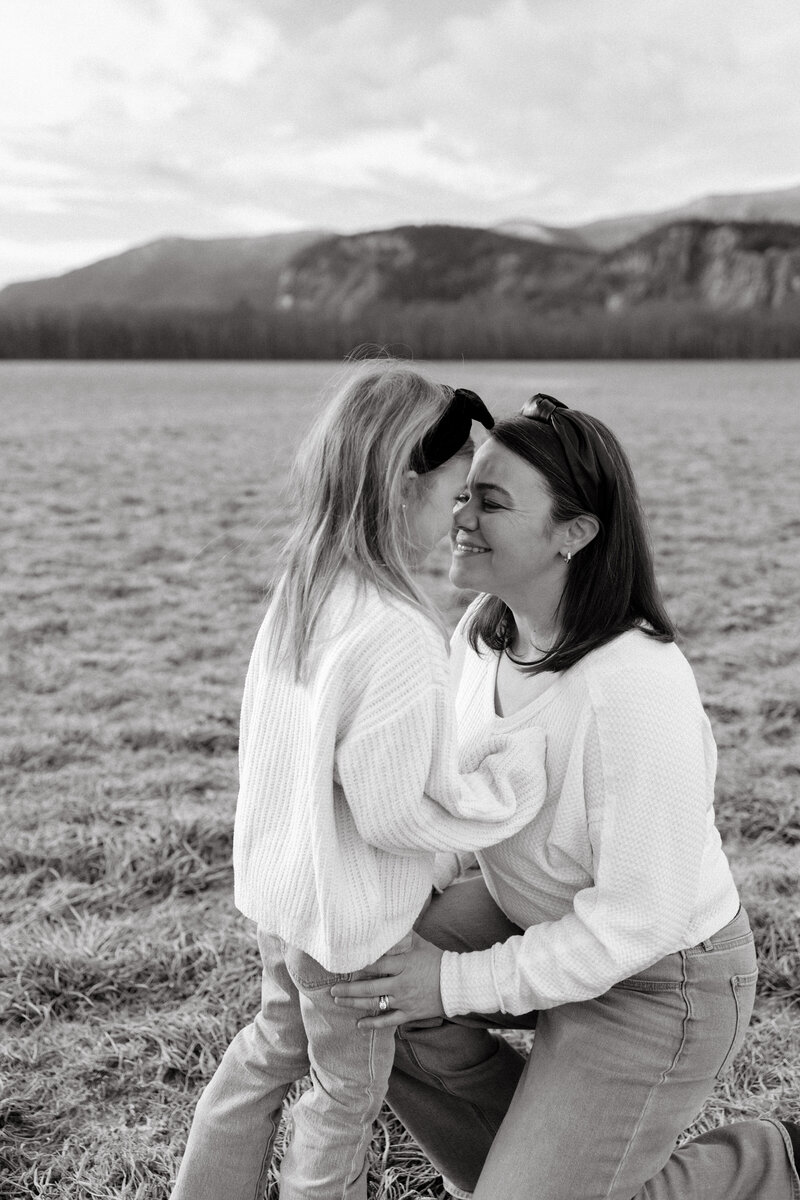 Heartfelt moments between mother and littles in a cozy setting.