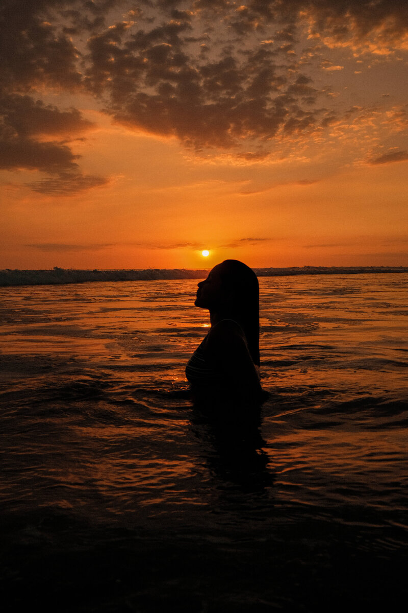 Portrait of a model at the beach during sunsset