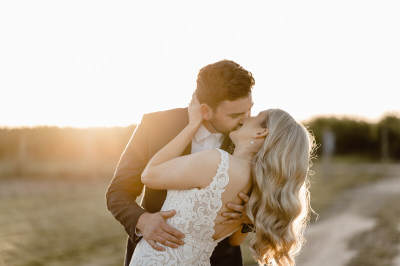 Bride and Groom Sunset Kiss