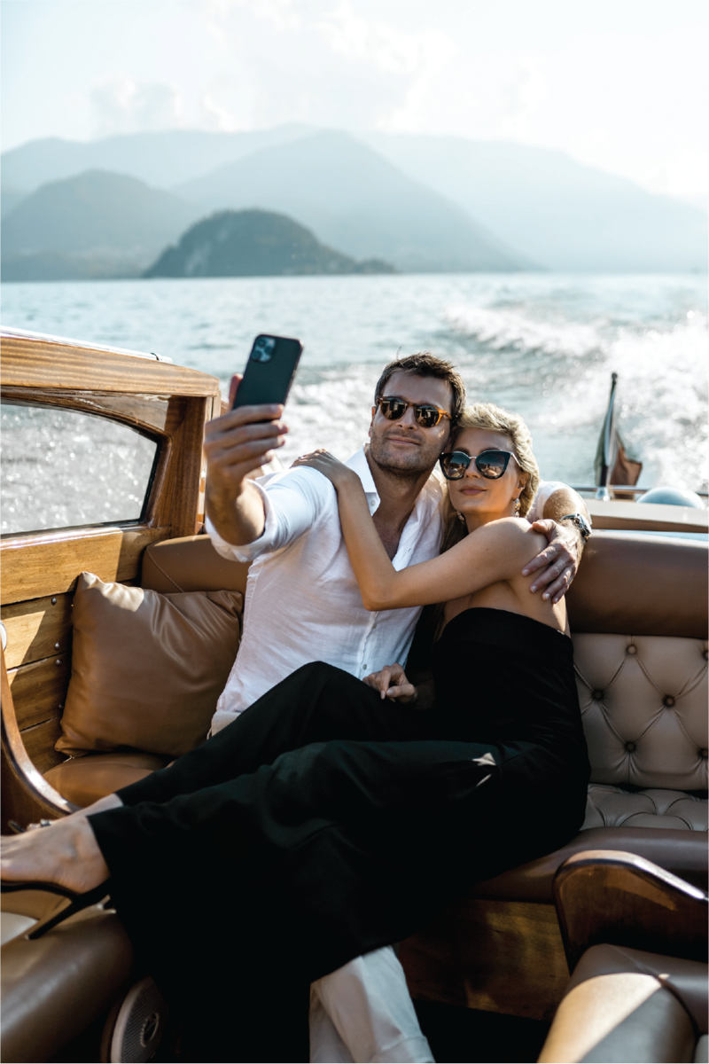 couple-taking-selfie-on-boat