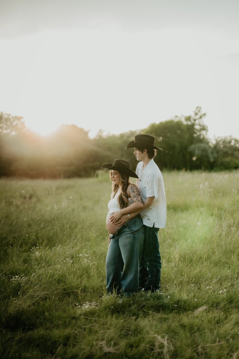 amarillo maternity session - couple pregnant in field in texas