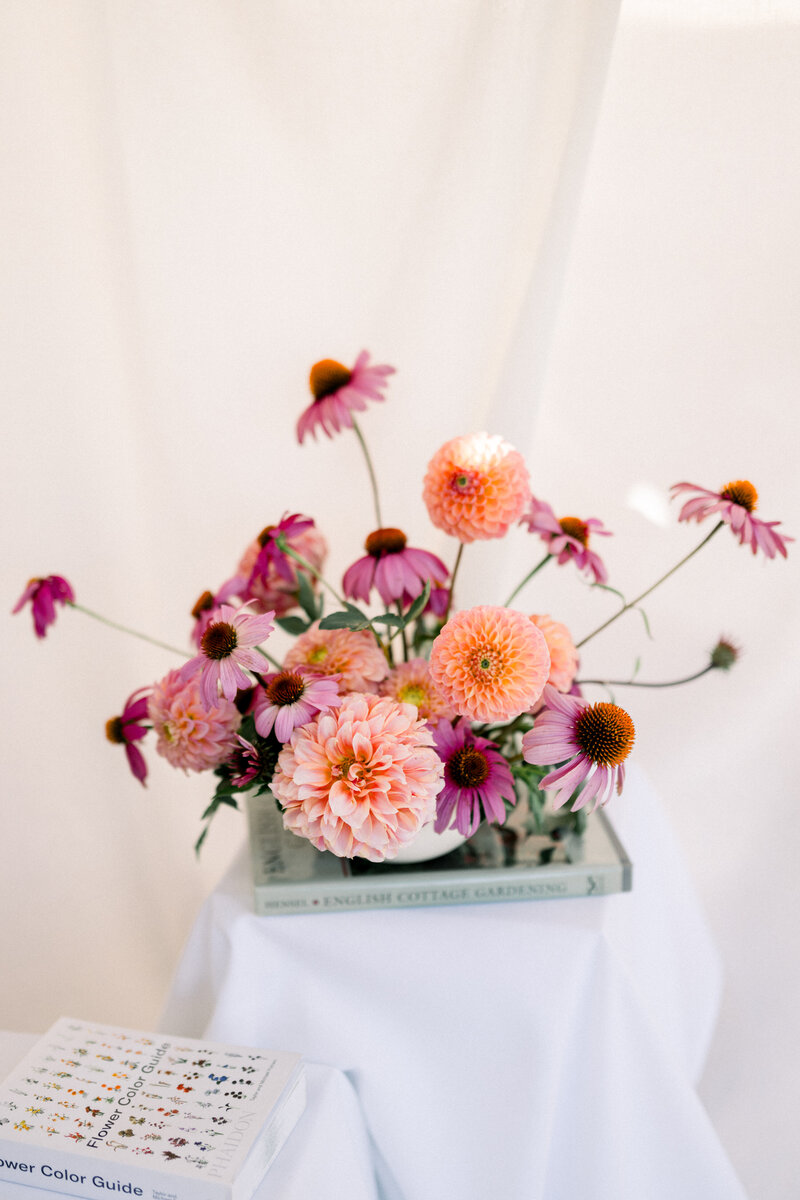 Outdoor wedding in Scottsdale Arizona styled with butter yellow florals, lavender florals, and ceramic pots at a stunning reception at Desert Mountain by Snapdragon Bloom Bar.