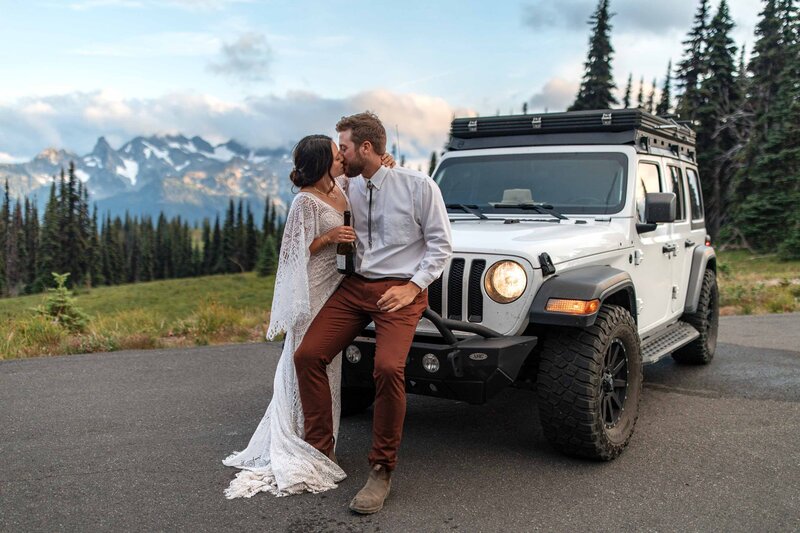 Happy elopement couple with Mount Rainier and a forest as a backdrop