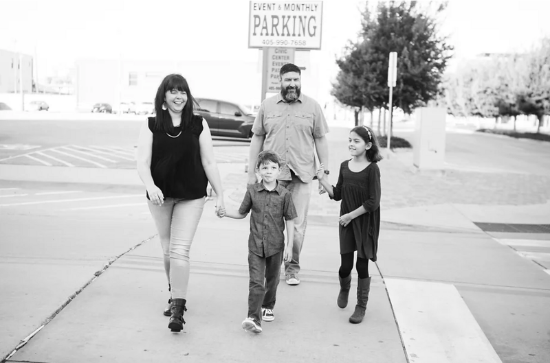 Sarah and her family walking across the street in OKC.