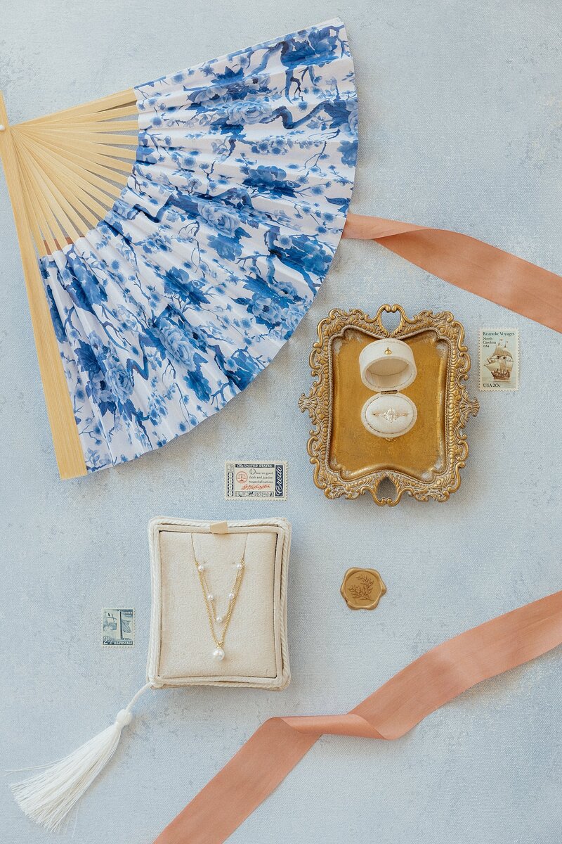 A blue and peach-toned flat lay.