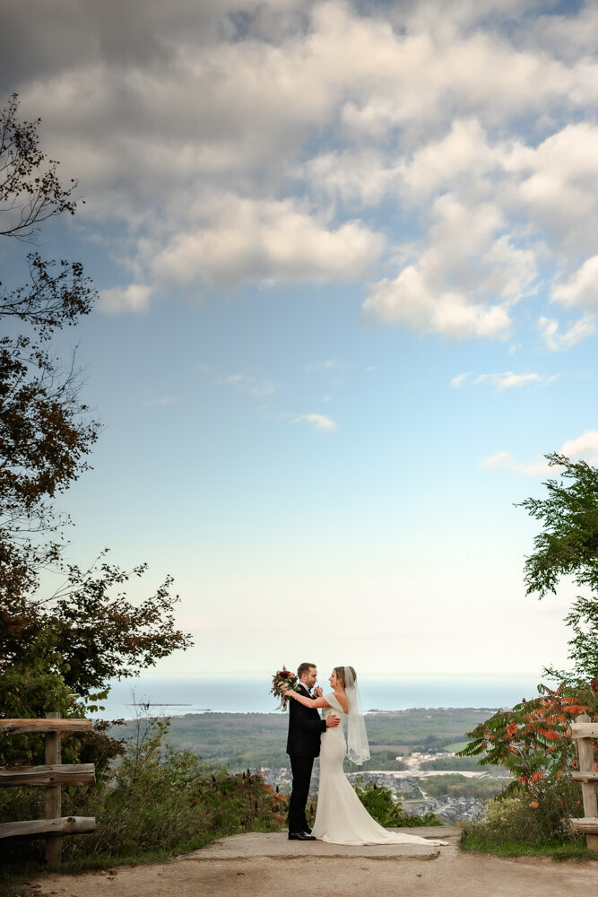 bride groom portrait top of Blue Mountain with view