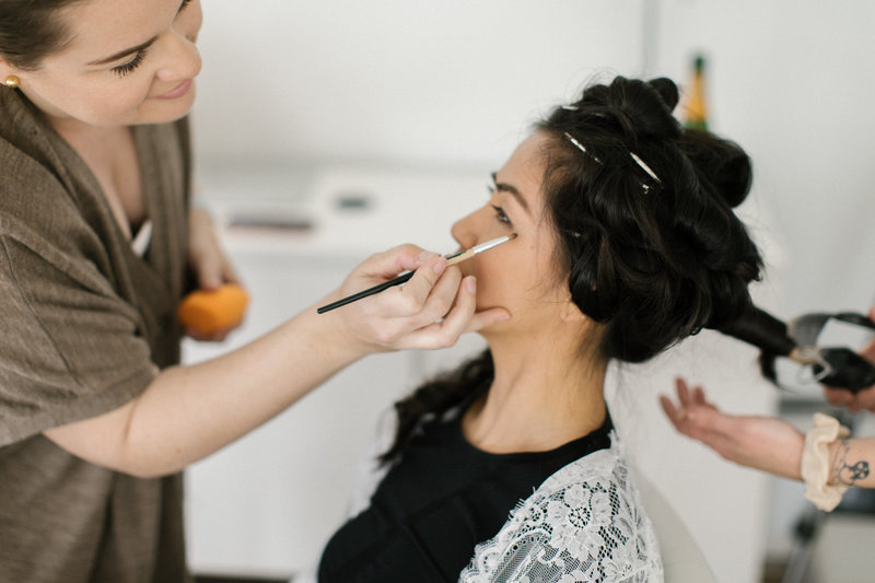 professional hair and makeup services during bridal boudoir session