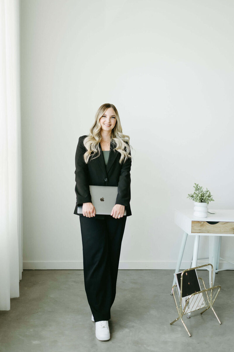 Karly Whitaker, certified HoneyBook Pro and systems strategist for creatives.