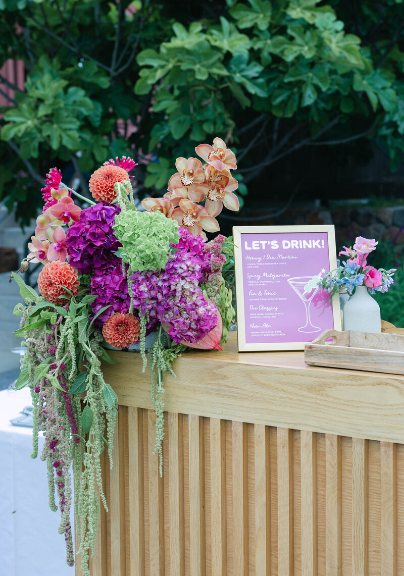 Wedding Photographer for Bay Area, close up of a floral arrangement at the cocktail hour. 