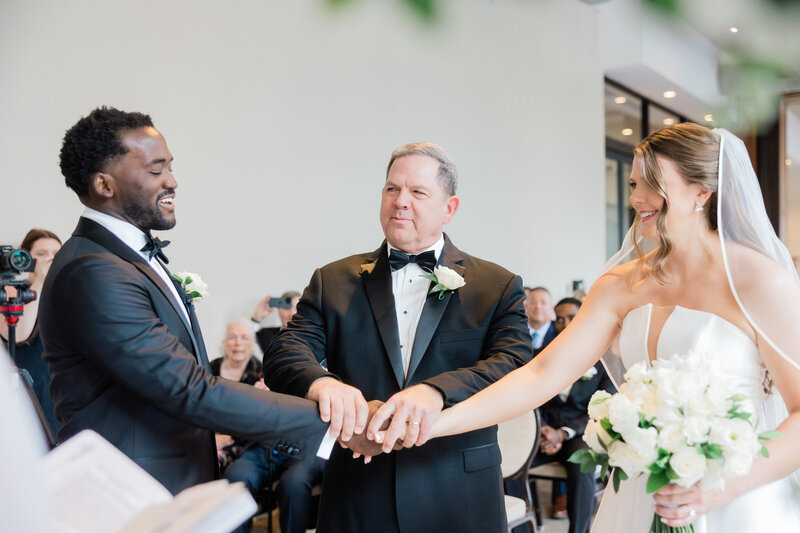 A bride and groom at their ceremony at the Ben, Autograph Collection in West Palm Beach