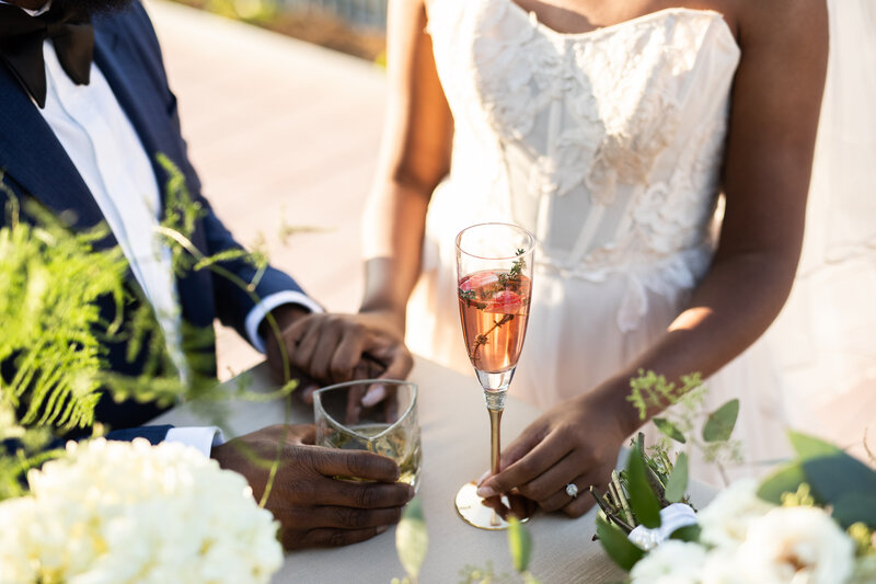Romantic wedding toast at a Raleigh wedding venue, planned by a full-service wedding coordinator.