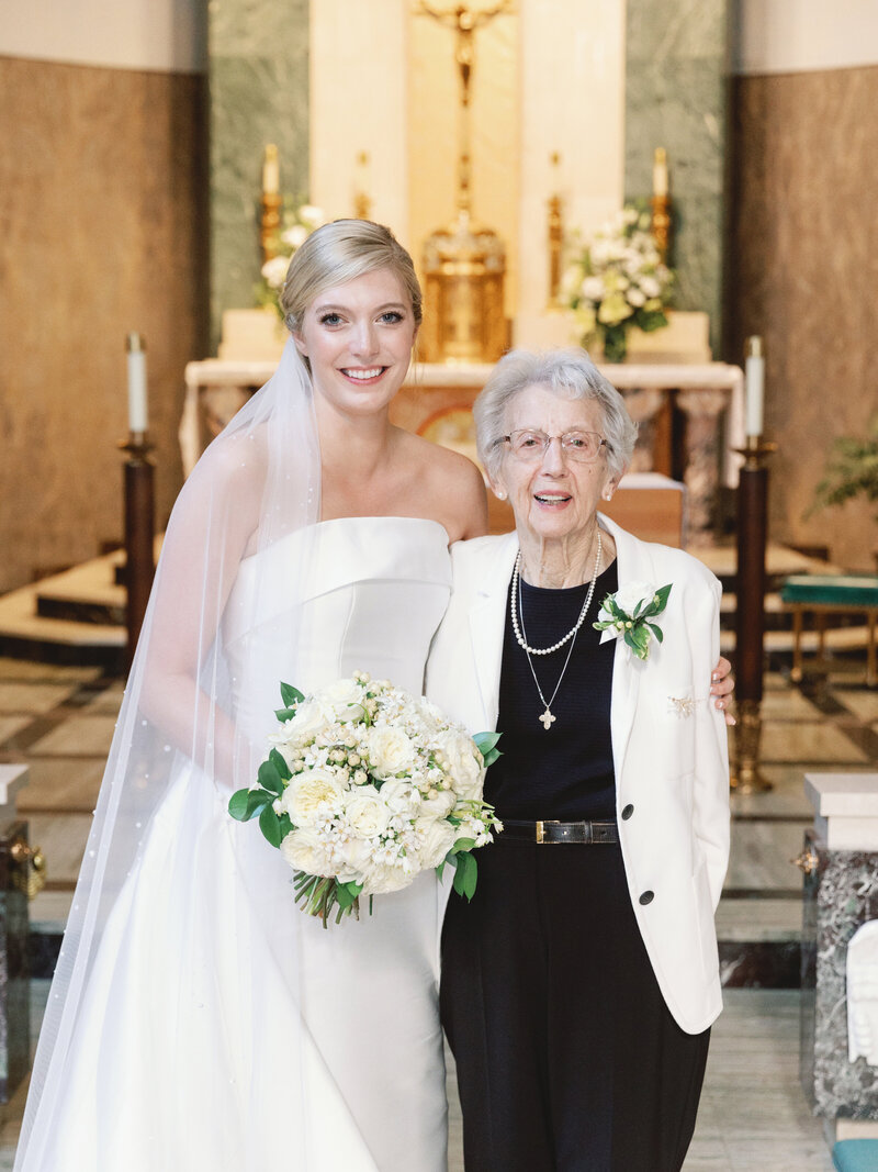 Modern bride and her Grandma wearing Grandma's 1950's vintage heirloom wax flower bridal crown restyled into a modern bridal hair comb and broach for Grandma