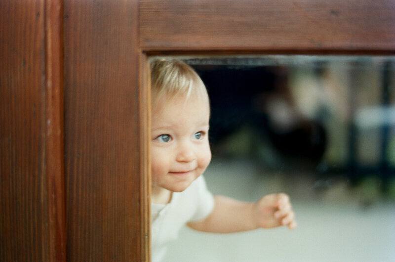 Wonder peeking through. Natural family photoshoot Sydney at home by Tealily