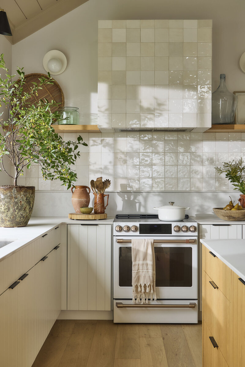 all white kitchen interior design that feels luxe and nature inspired.
