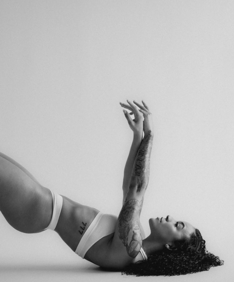 Model posing in editorial beauty shoot with soft lighting captured by Tyler Botdorf