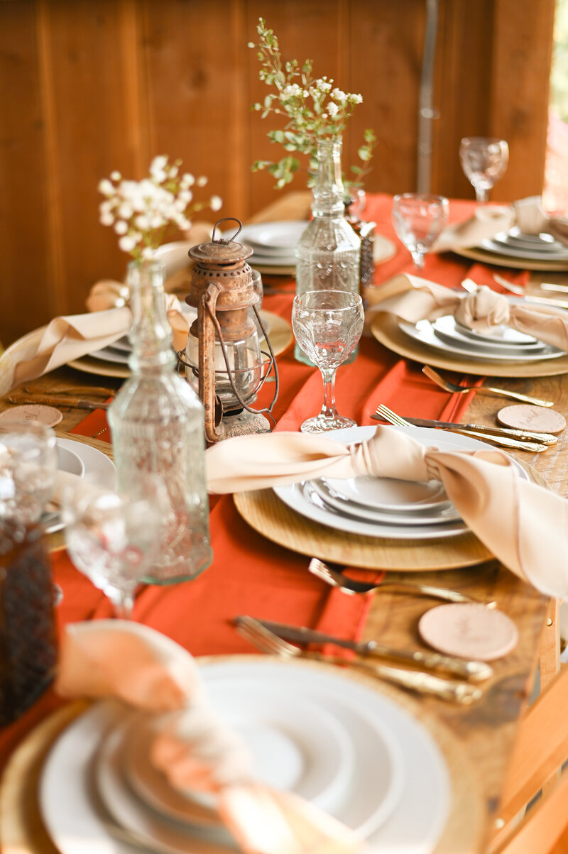 Table setting at barn wedding in Nevada. 