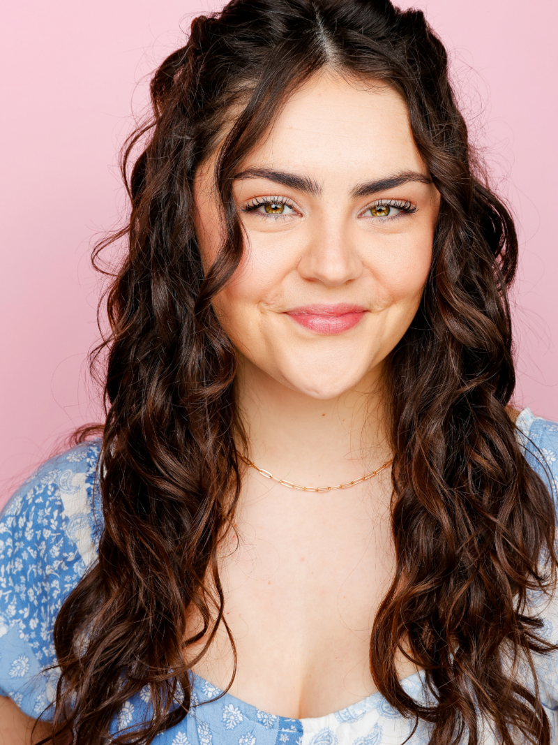 headshot on pink background