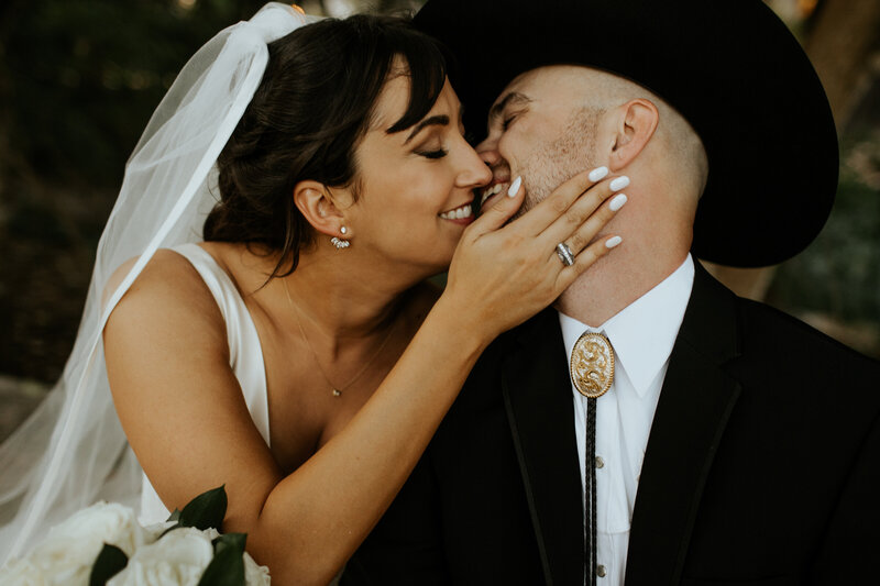 Bride and groom close to kiss