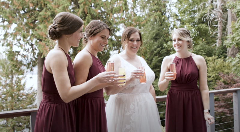 bride doing a toast with bridemaids