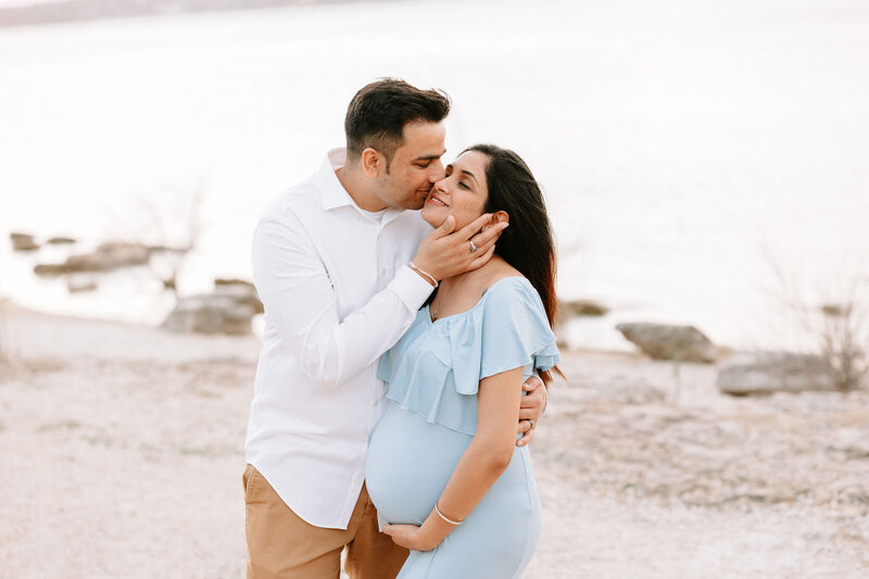 Mom and baby taking photos in field at Cibolo Nature Park in San Antonio Texas