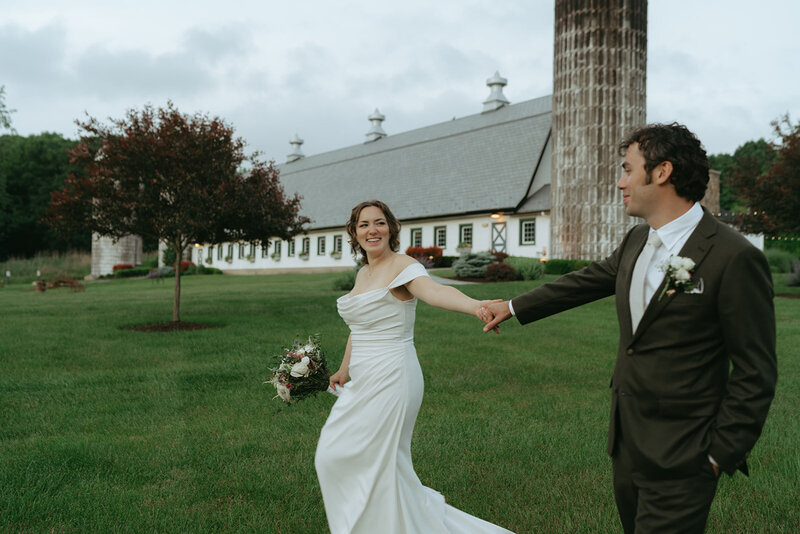 couple walking on their wedding day, captured by Elsie Goodman, an NYC engagement and wedding photographer