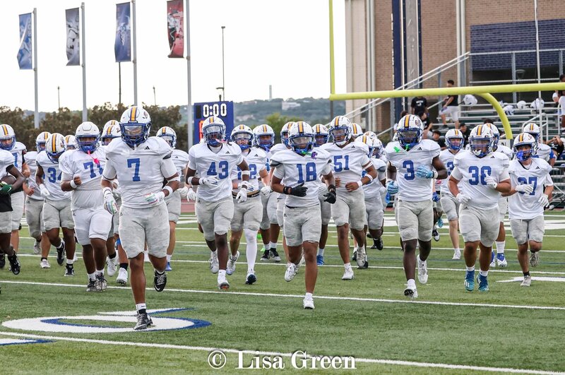 Image of personal fitness trainer sitting on road
