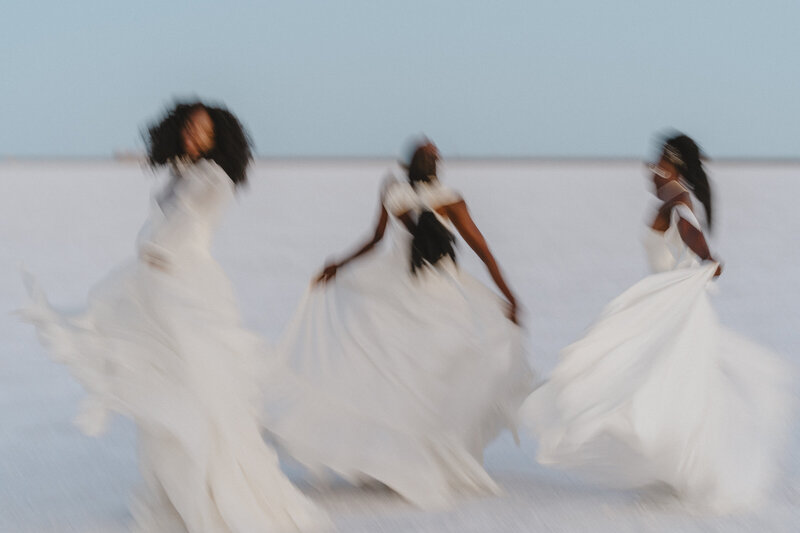 Photo of Bride running at the Salt Flats