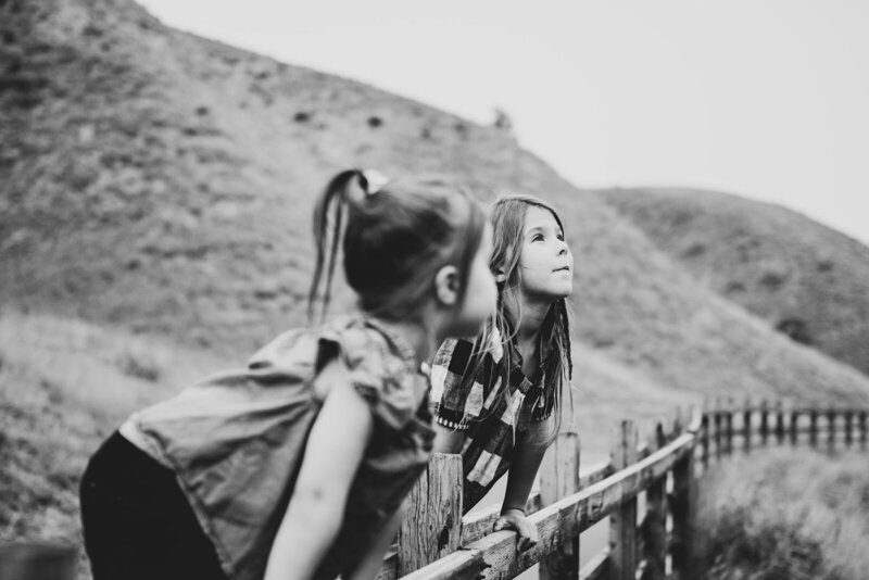 sisters-on-a-fence