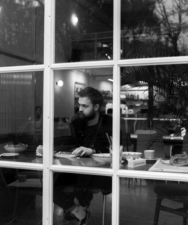 Man in a restaurant window