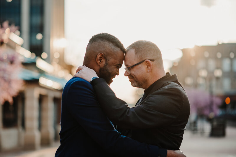 downtown springfield engagement biracial gay couple