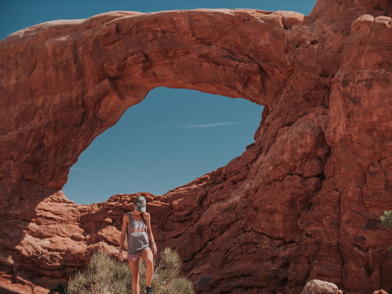 woman walking in arches