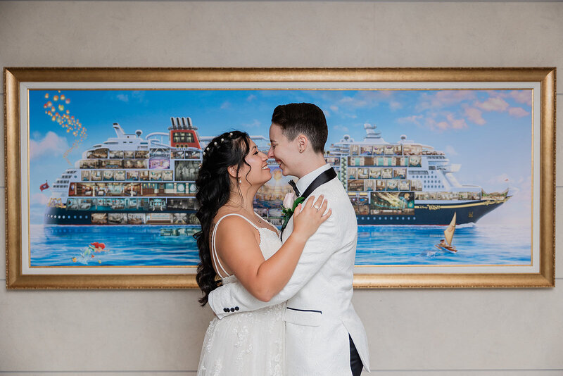 Bride smiling over shoulder as her and groom walk on Disney Cruise